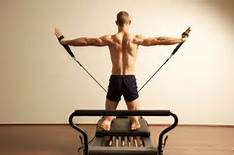 man on reformer